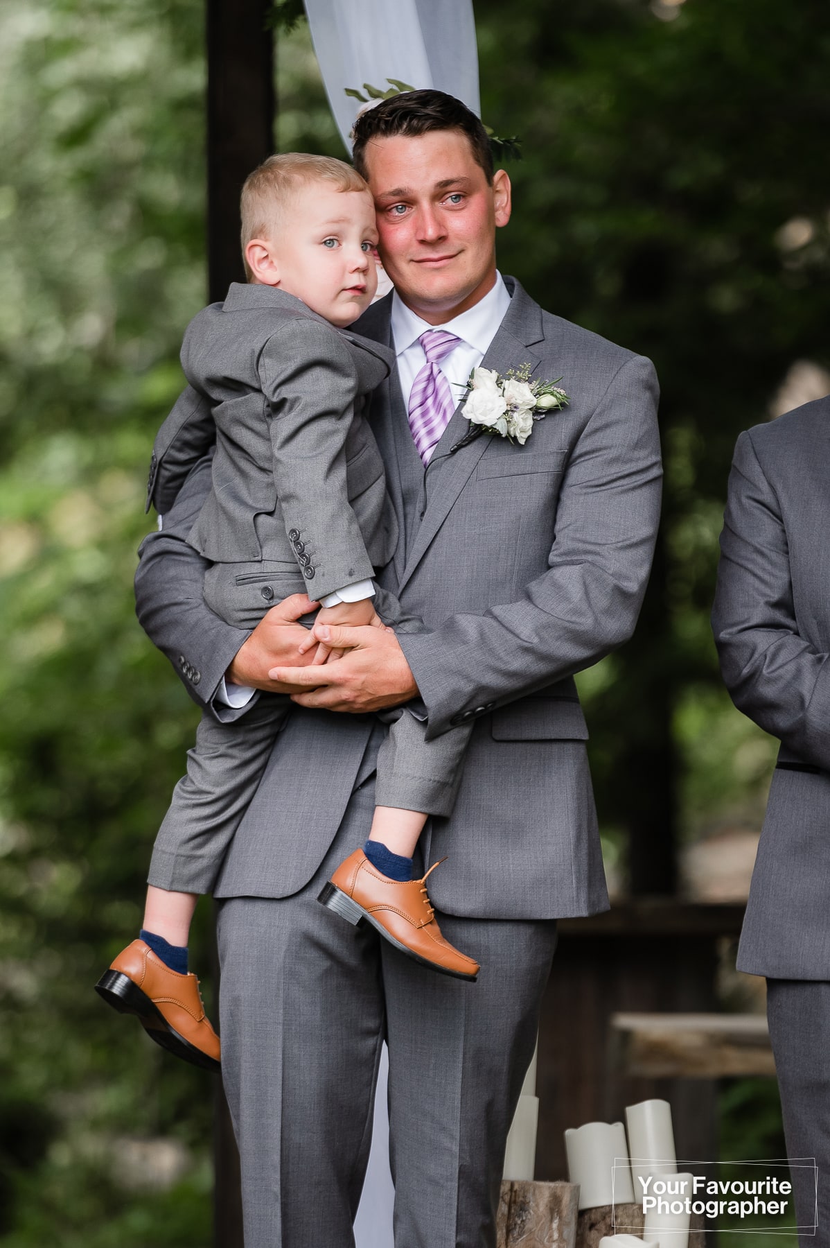 Groom and son waiting for bride