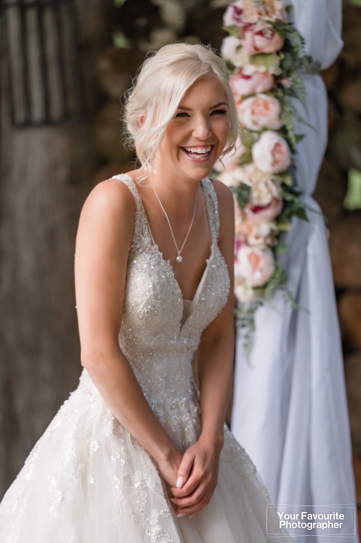 Smiling bride at ceremony