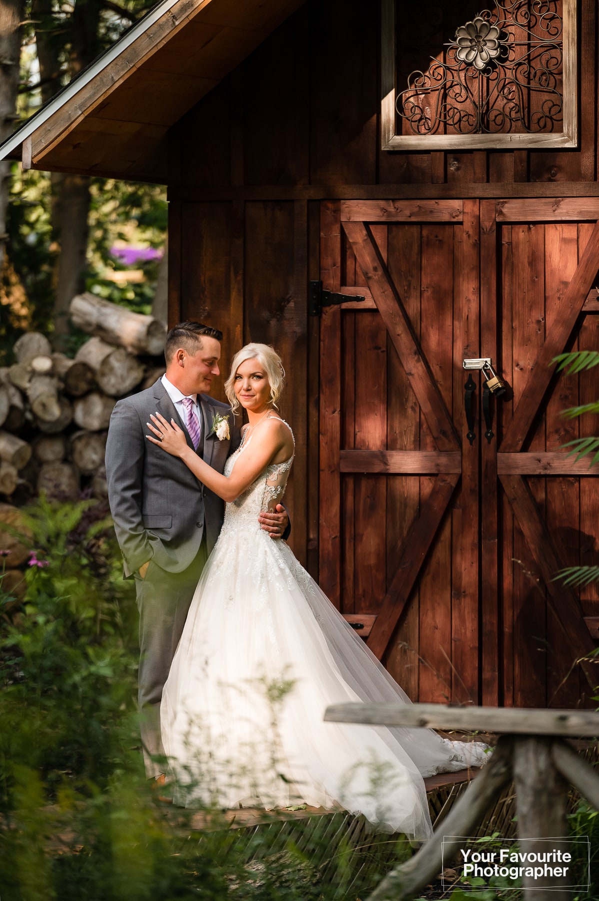 Formal photo of bride and groom at rustic location