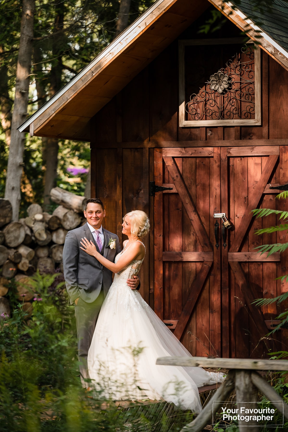 Formal photo of bride and groom at rustic location