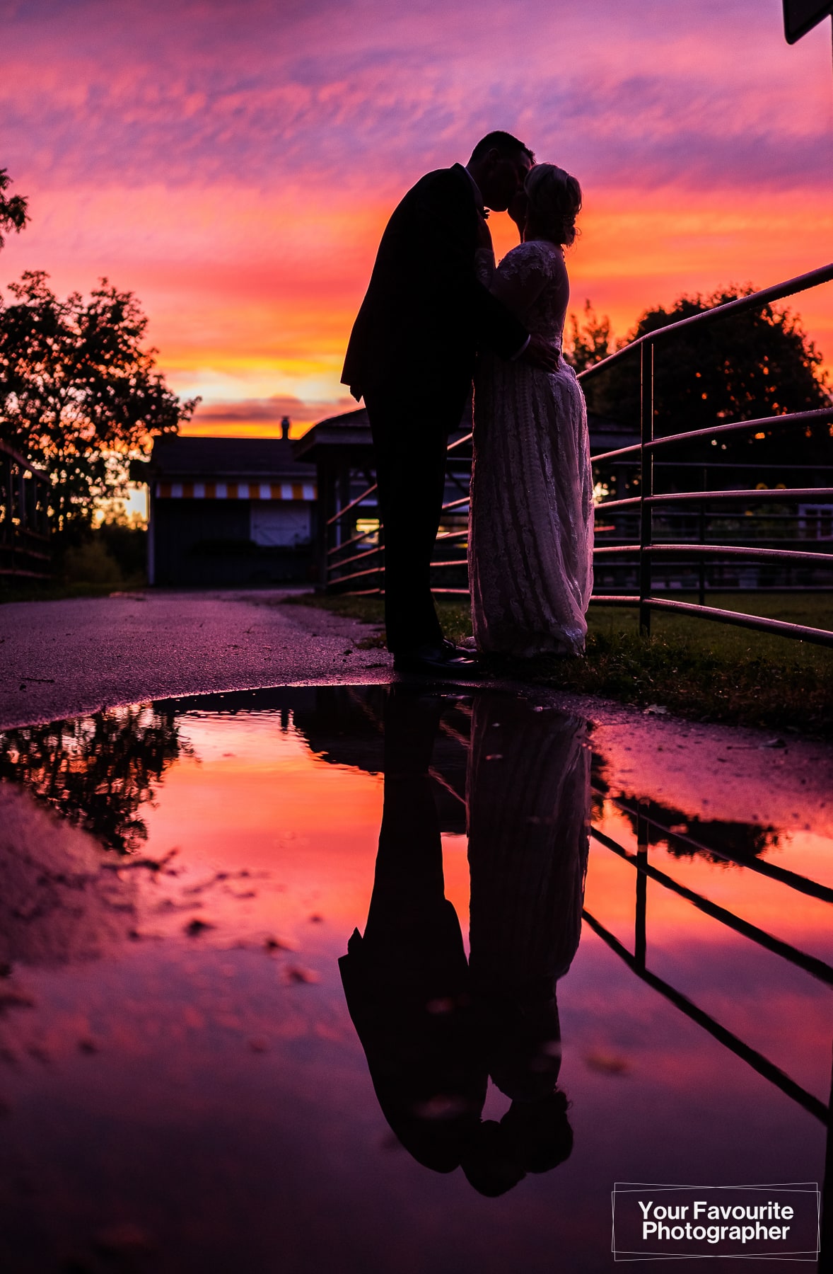 Sunset silhouette photo of bride and groom