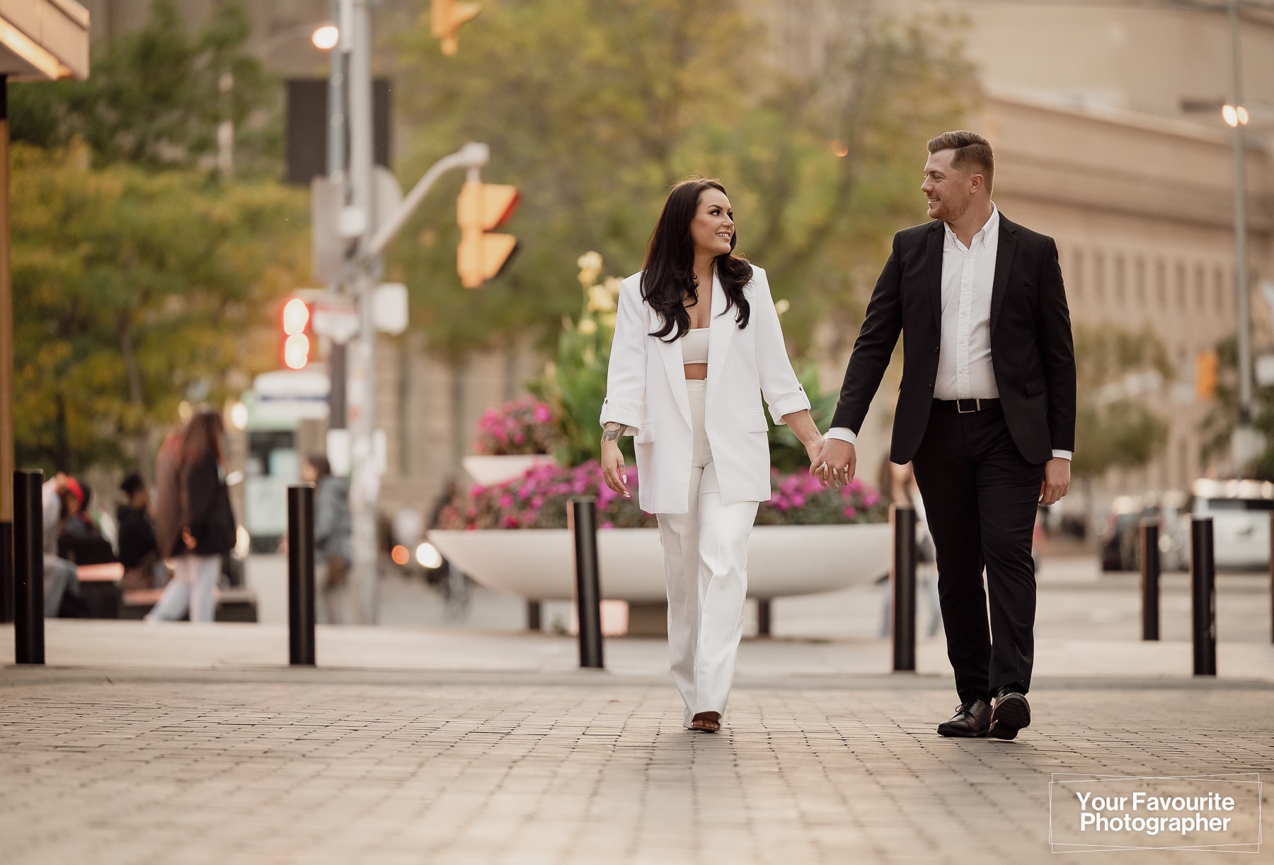 Rob and Sam's engagement photo shoot on the streets of downtown Toronto near Union Station