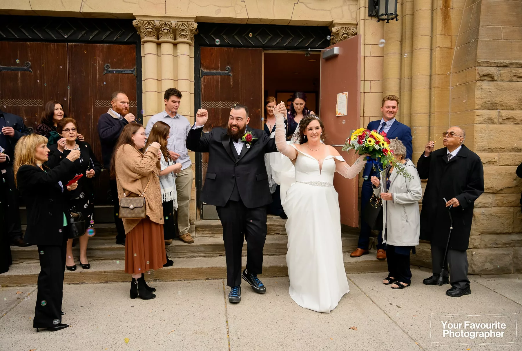 Bride and groom leaving St. George's Greek Orthodox Church in downtown Toronto