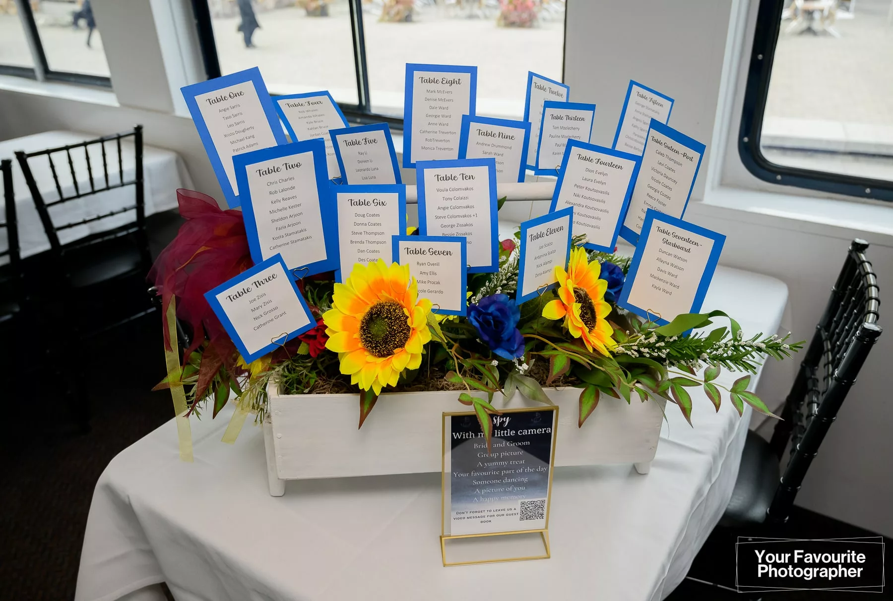 Wedding table seating chart in a flower box