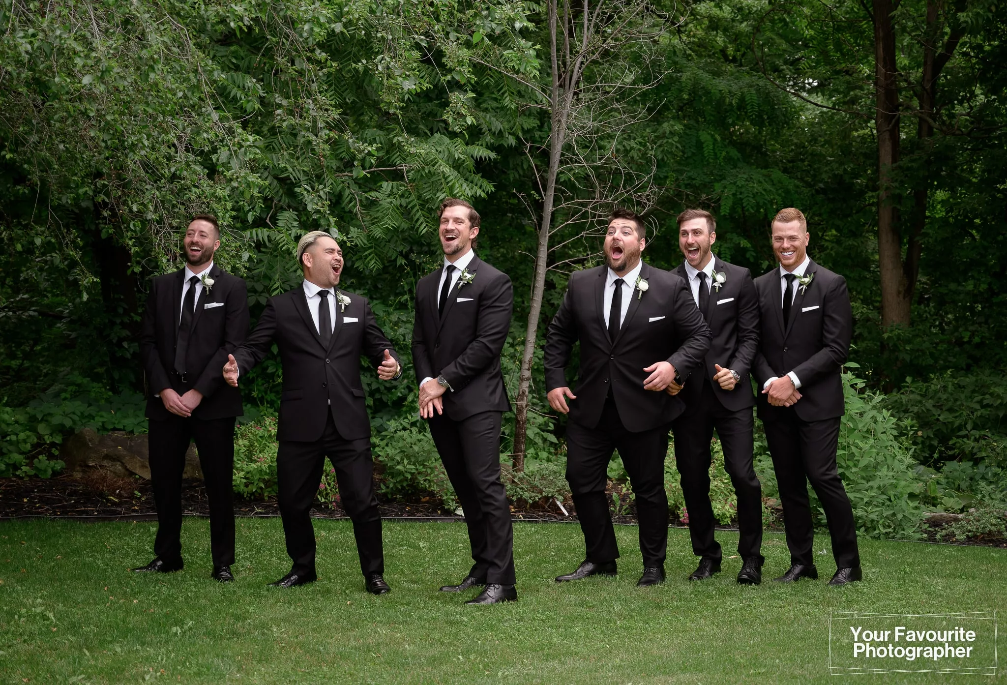 Groomsmen reacting to the bride "icing" them at The Doctor's House wedding venue