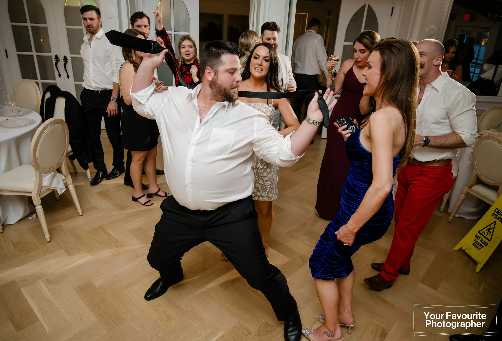 Wedding guests getting rowdy on the dance floor
